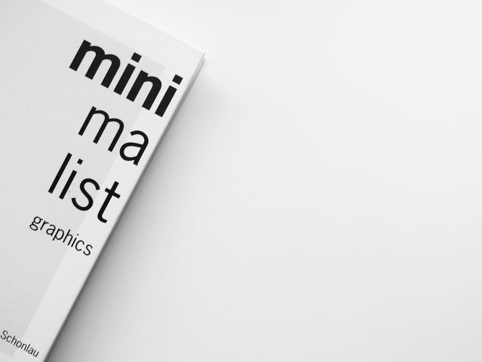 A book with the title Minimalist Graphics on a White Background
